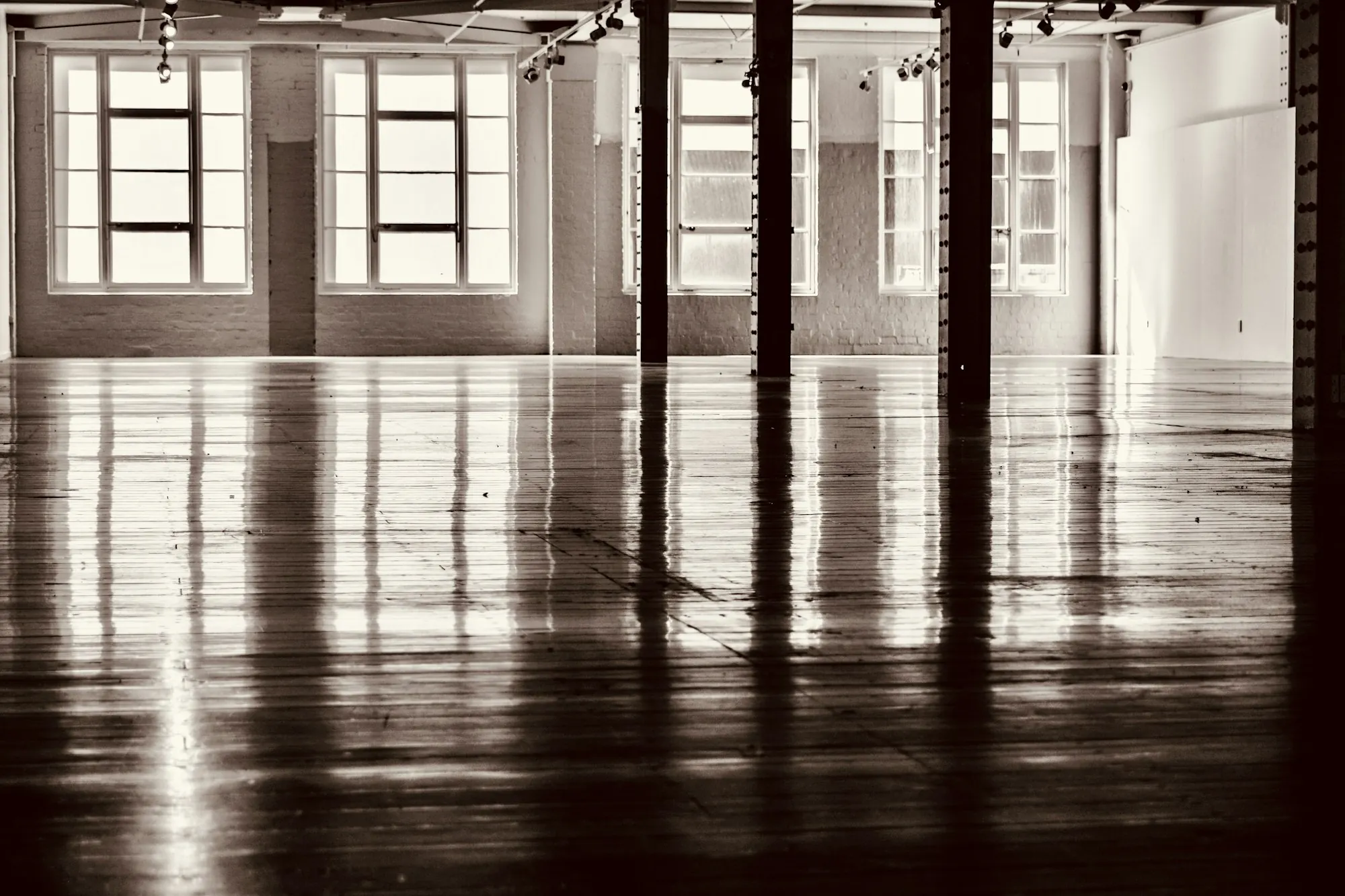 Loft space with a glossy, freshly finished floor
